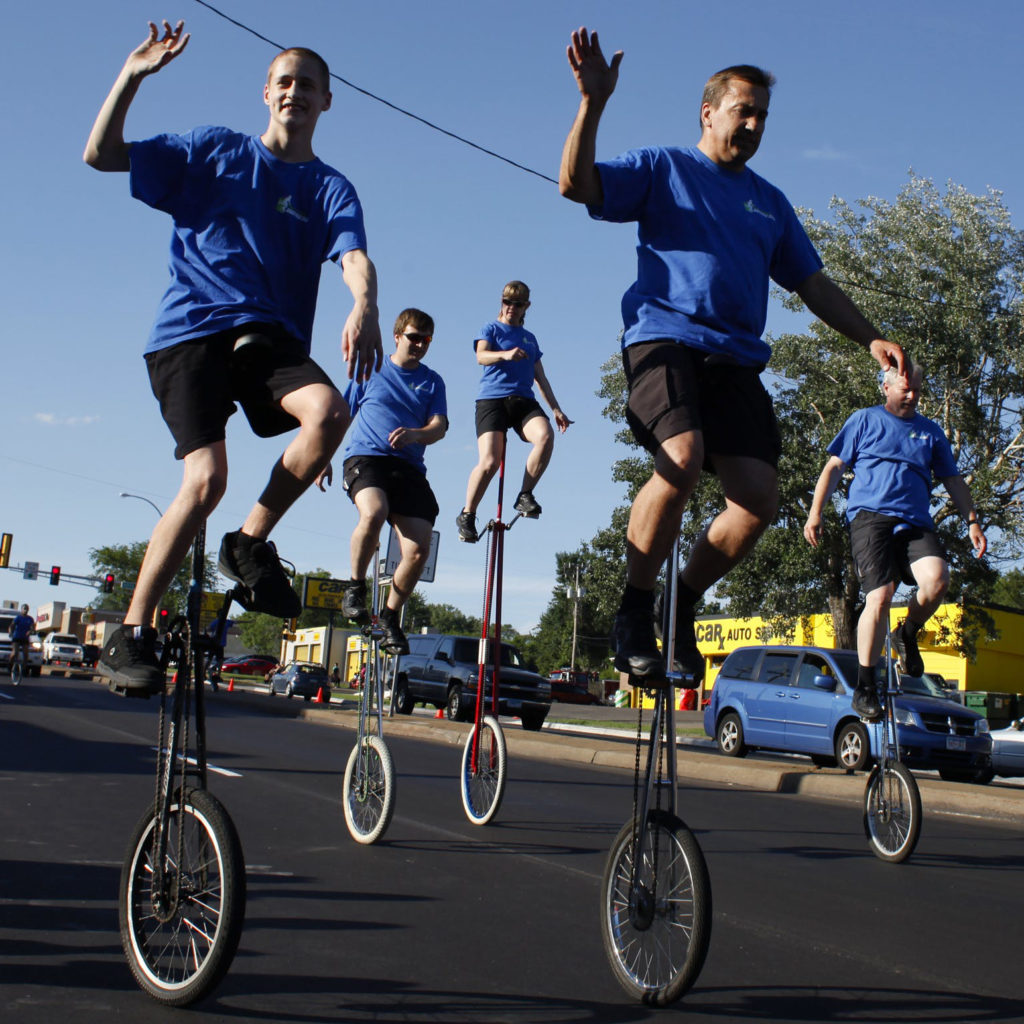 Unicycle riders in the Columbia Heights Jamboree parade