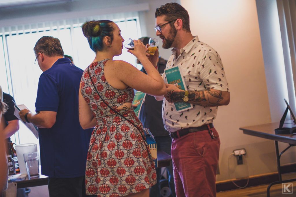 A couple enjoying beer samples