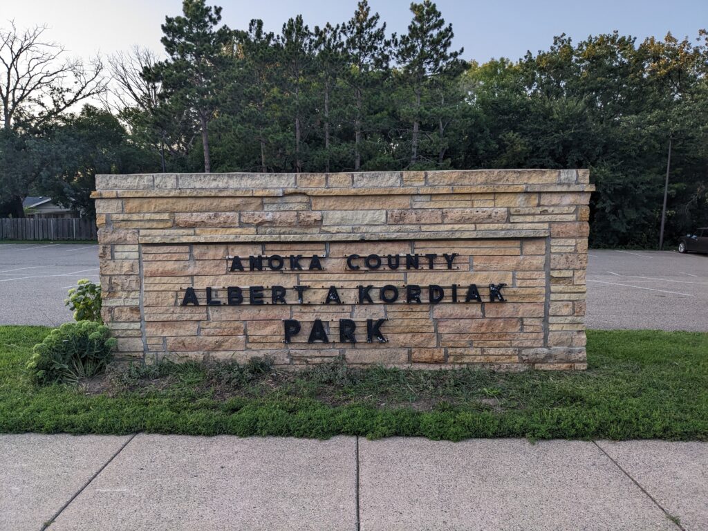Monument sign in Columbia Heights, MN that reads Anoka County Albert A. Kordiak Park